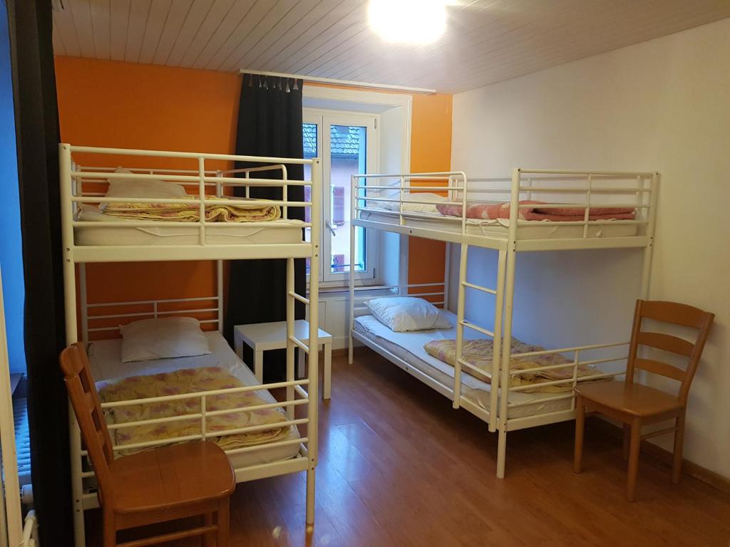 Postel nebo postele na pokoji v ubytování Bellpark Hostel