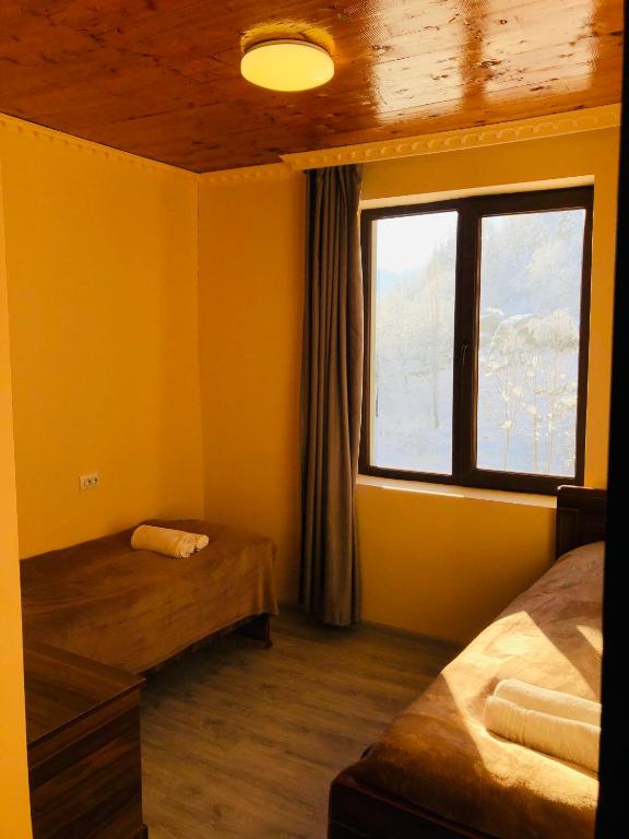 Postel nebo postele na pokoji v ubytování River side SVANETI