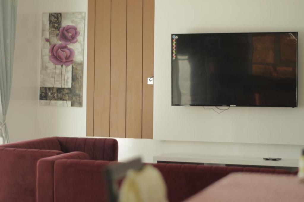TV a/nebo společenská místnost v ubytování Sab Bani Khamis House