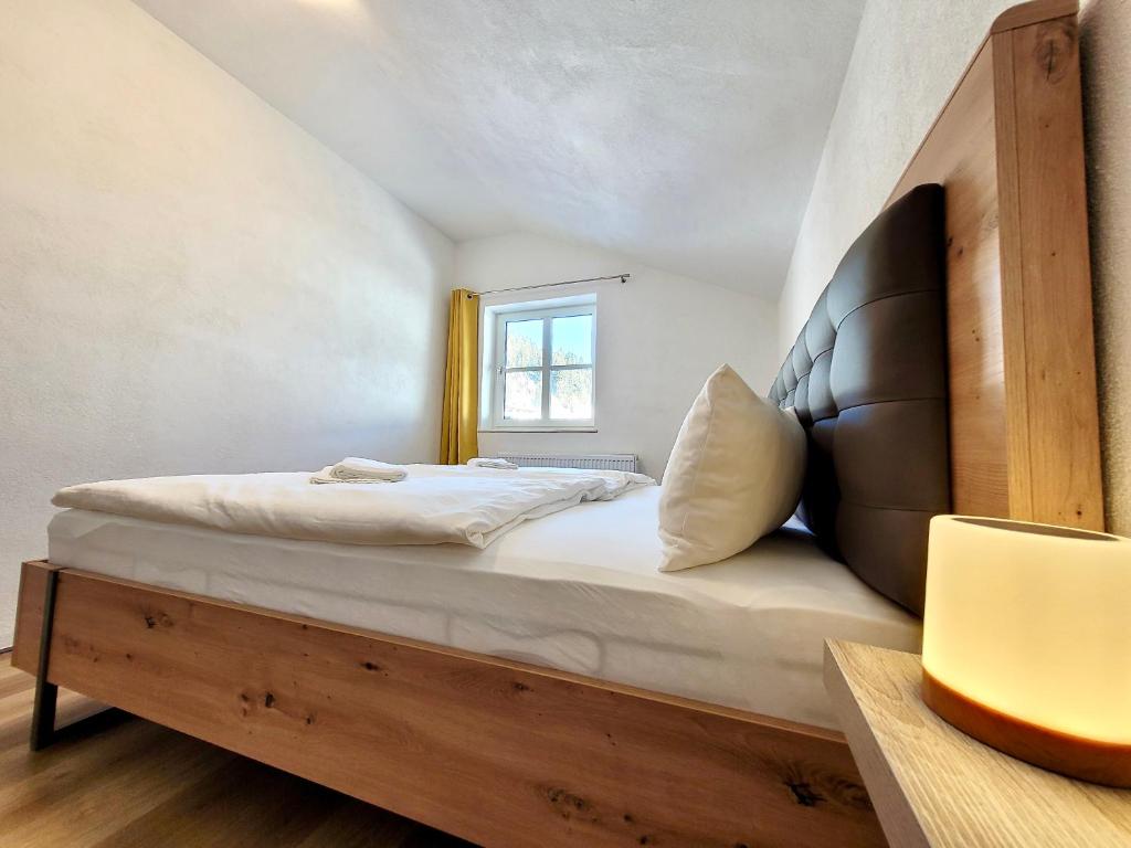 Posteľ alebo postele v izbe v ubytovaní Ferienwohnung Flachau Oberlehengut