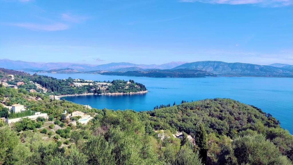 an island in the middle of a large body of water at Nikolas House in Corfu