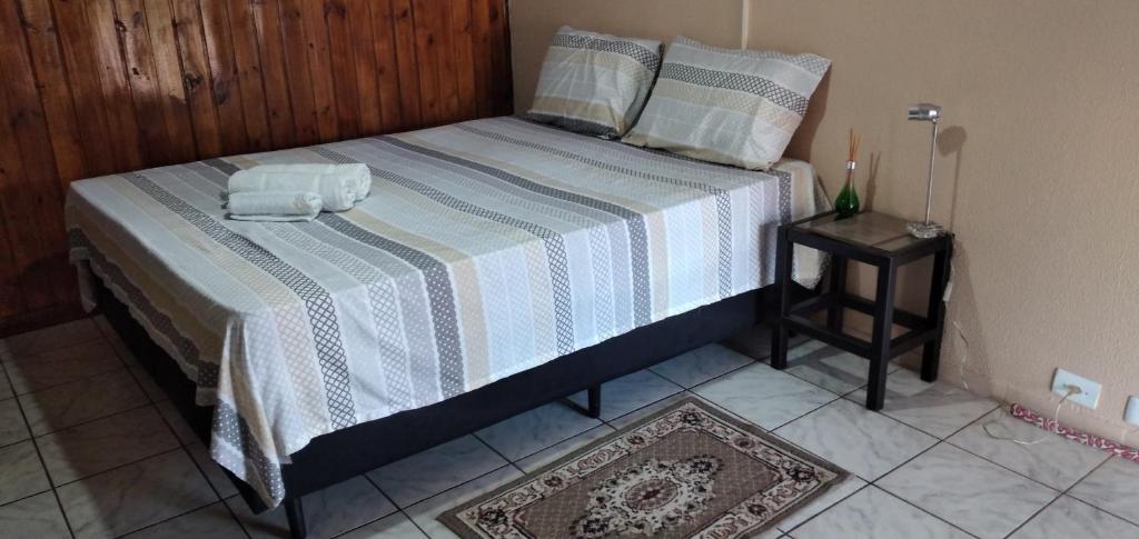 Postel nebo postele na pokoji v ubytování Pousada Belvedere