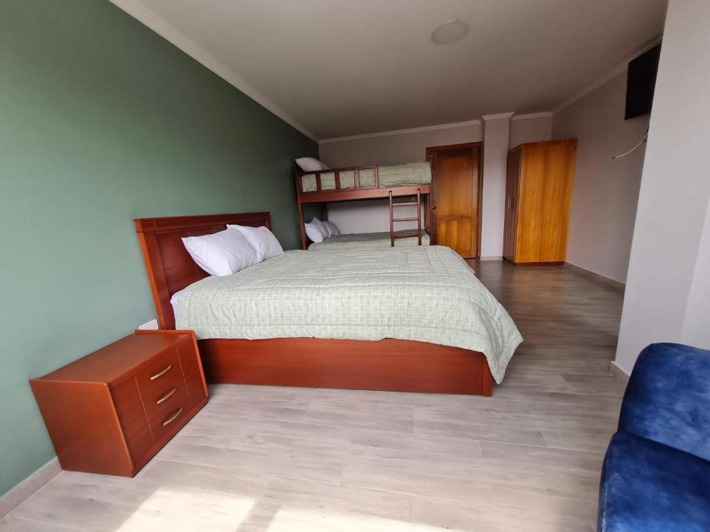 Postel nebo postele na pokoji v ubytování Hostal Morlaquita