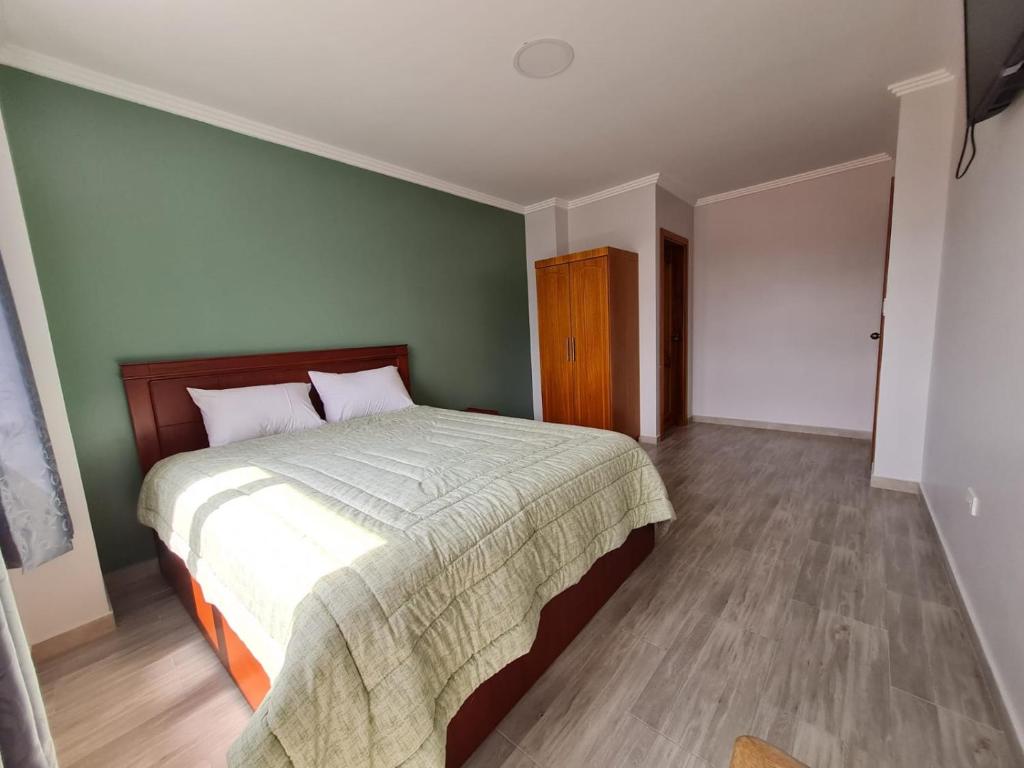 Postel nebo postele na pokoji v ubytování Hostal Morlaquita