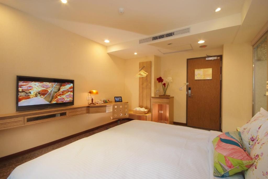 TV a/nebo společenská místnost v ubytování NAGAHIRO Hotel