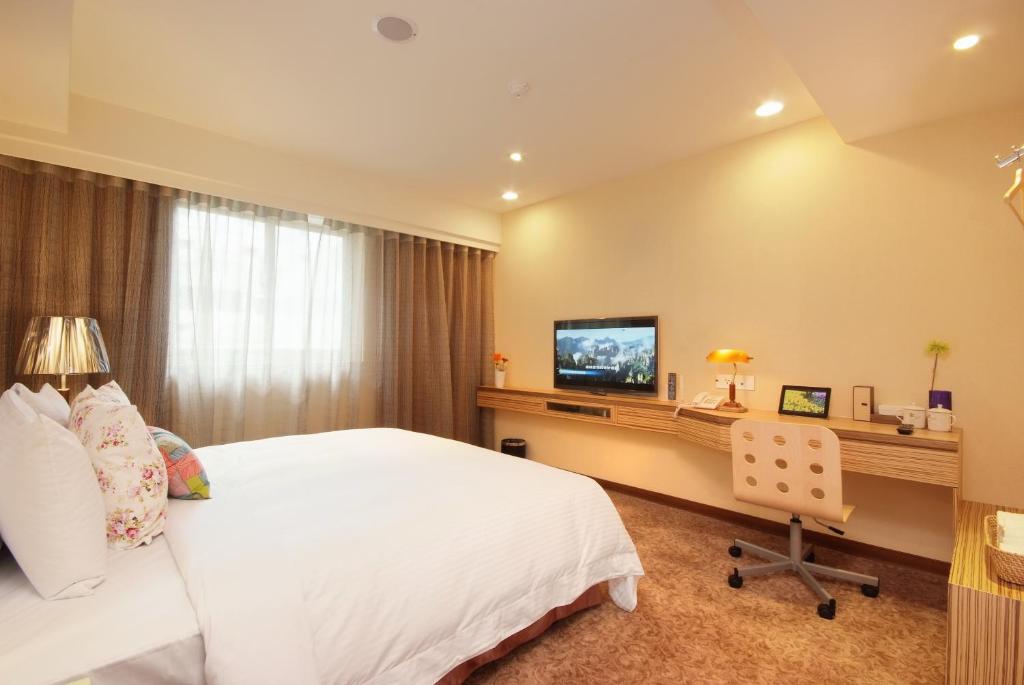 TV a/nebo společenská místnost v ubytování NAGAHIRO Hotel