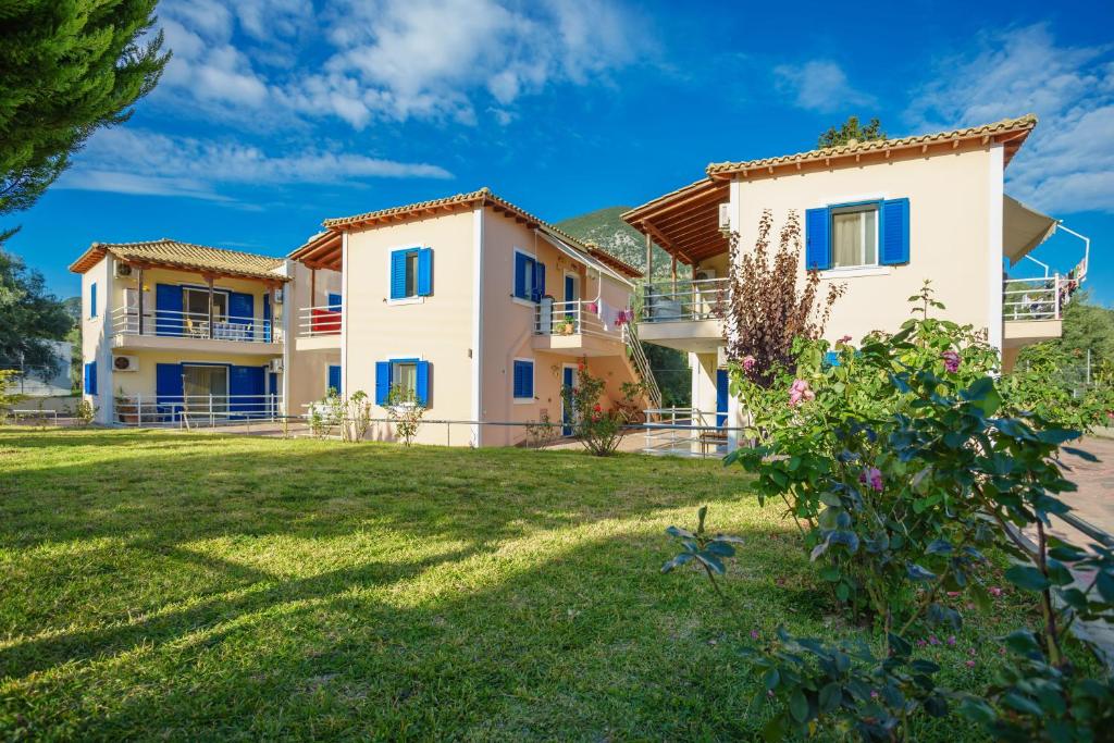 a view of the villas from the yard at Alexandros Luxury Apartments Nydri in Nydri