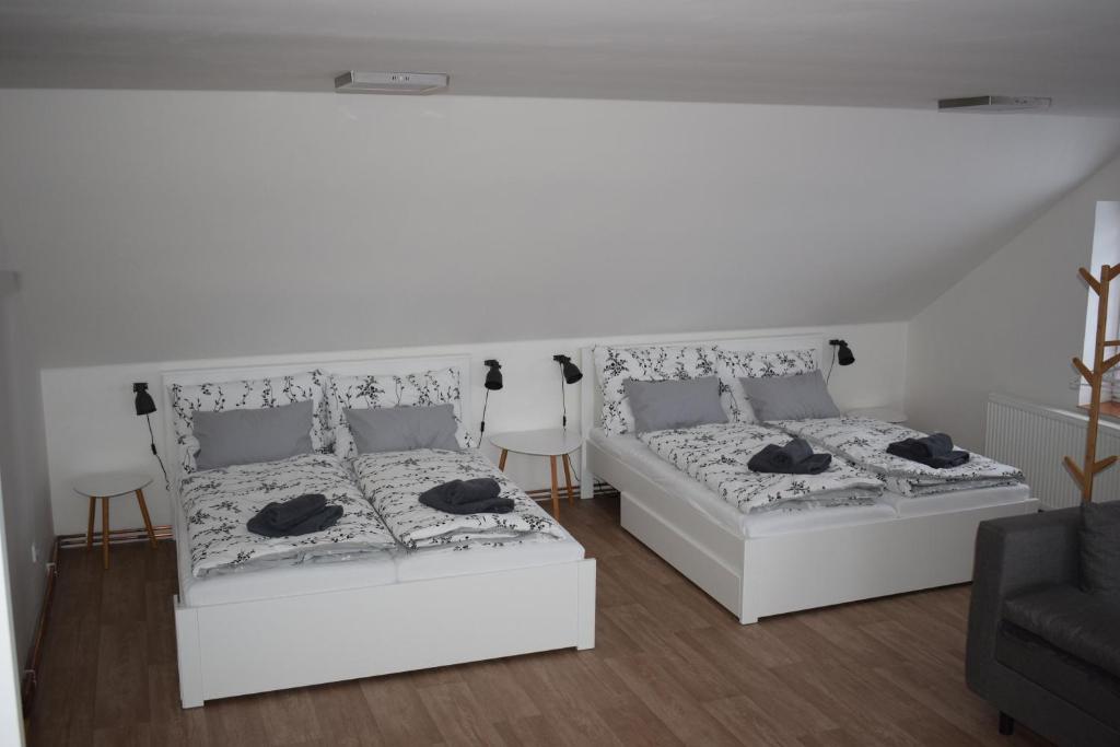 Postel nebo postele na pokoji v ubytování Penzion Víra