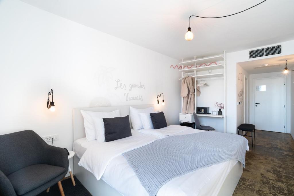 Una cama o camas en una habitación de Art Hotel Tartini
