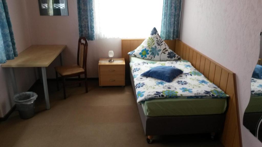 Postel nebo postele na pokoji v ubytování Hotel Andernacher Hof