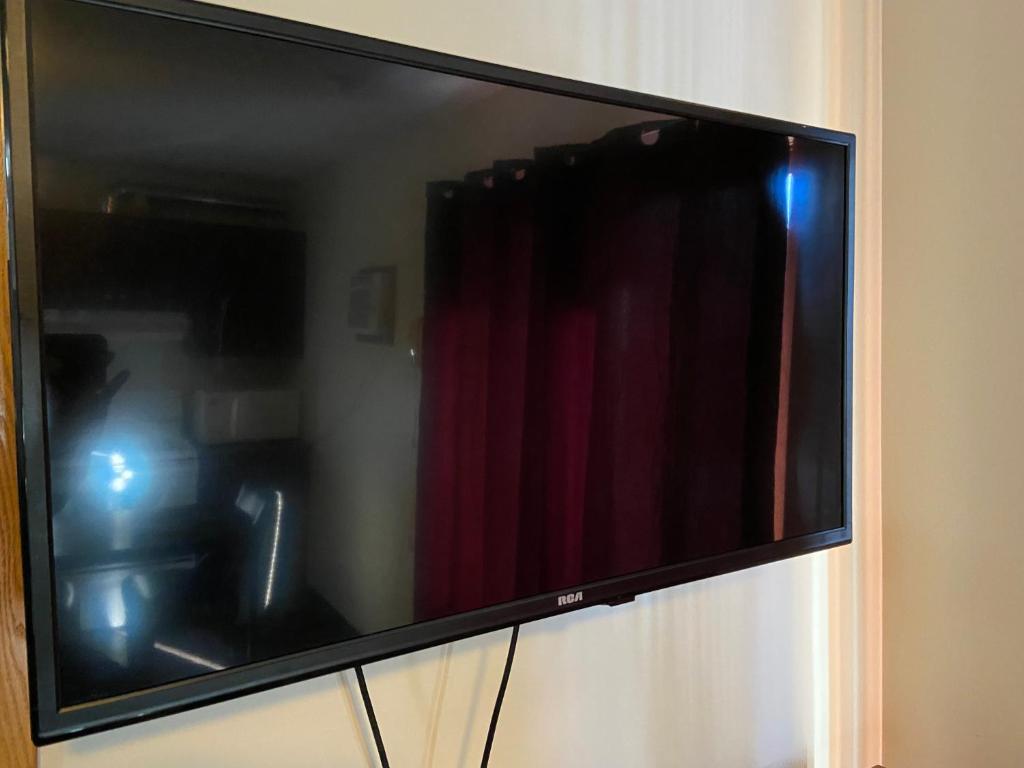 TV a/nebo společenská místnost v ubytování Mountain View Motel