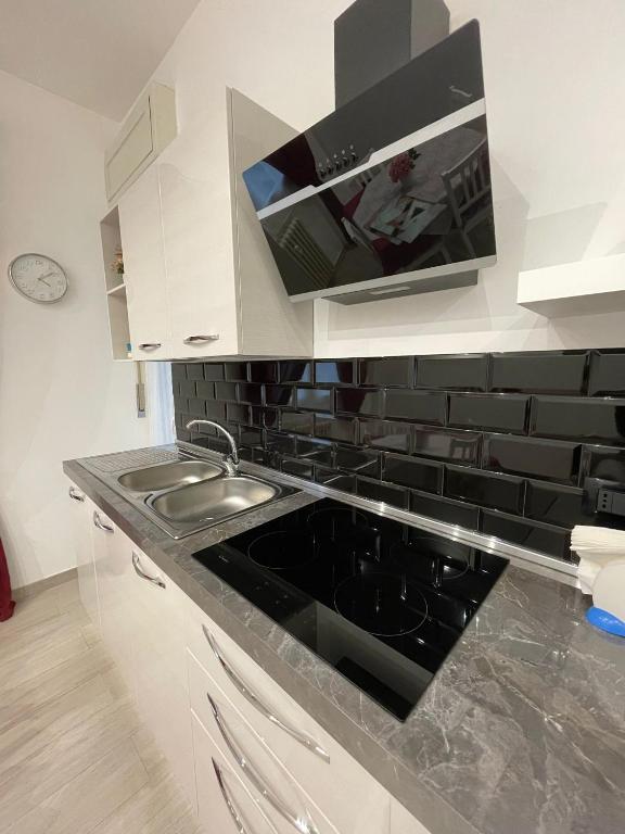Kuchyň nebo kuchyňský kout v ubytování Alice sweet home