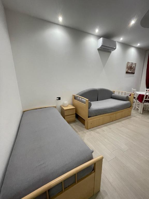 Postel nebo postele na pokoji v ubytování Alice sweet home