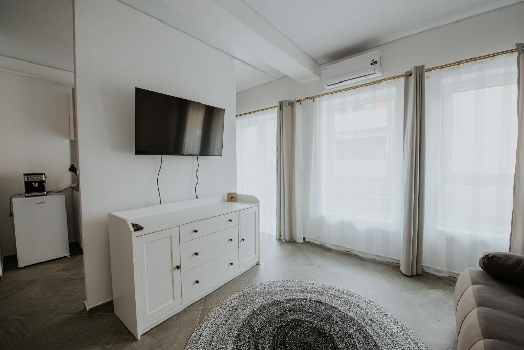 TV a/nebo společenská místnost v ubytování THE NOOK APARTHOTEL