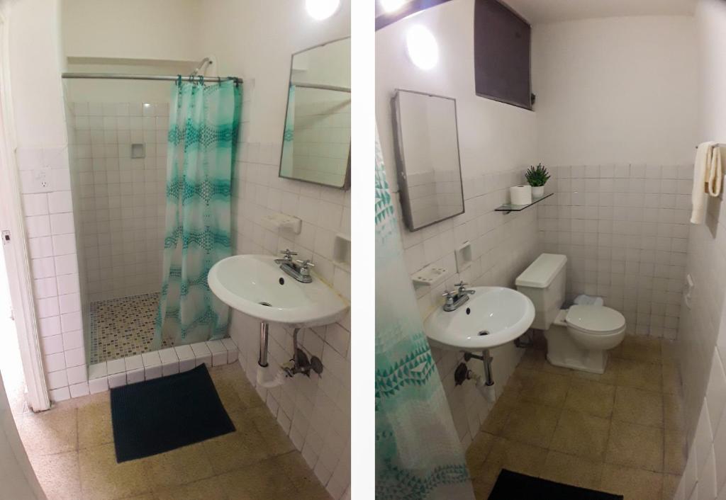 Koupelna v ubytování Habitaciones privadas en un departamento encantador