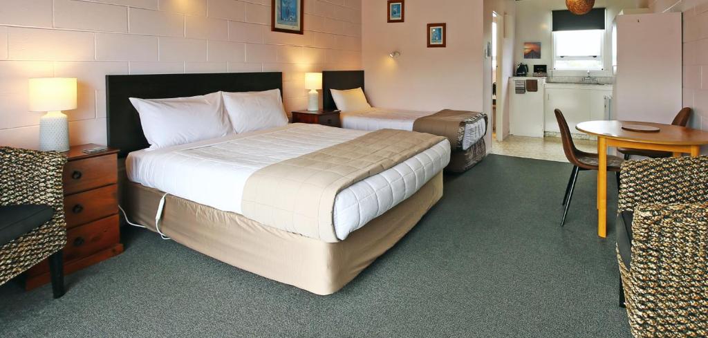 Postel nebo postele na pokoji v ubytování 289 Midway Motel