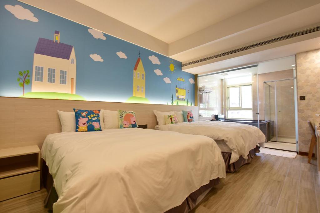 Postel nebo postele na pokoji v ubytování Muen Yuan Dong Hot Spring Hotel