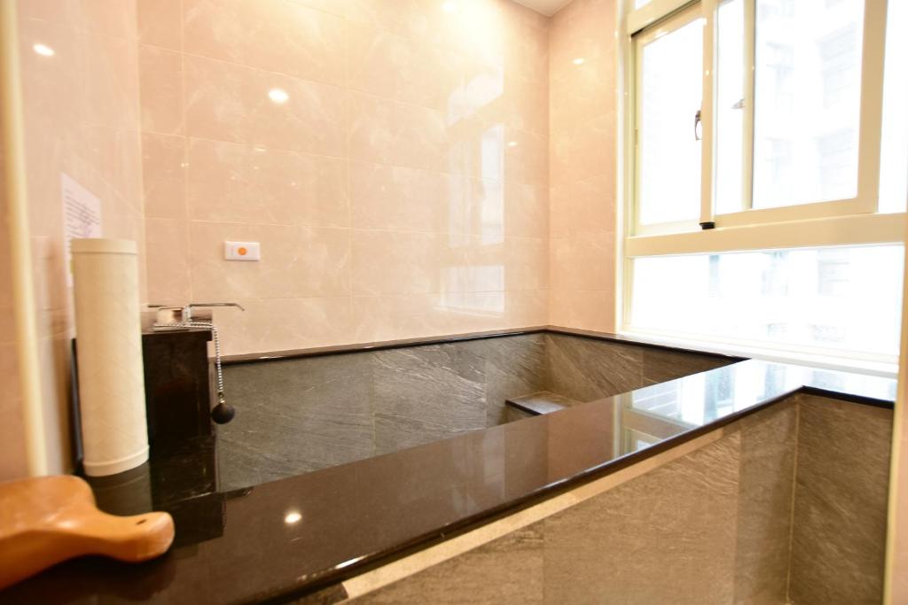 Fotografie z fotogalerie ubytování Muen Yuan Dong Hot Spring Hotel v destinaci Ťiao-si