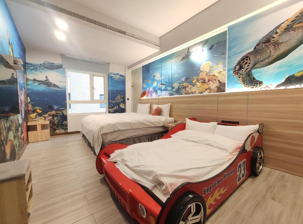 Postel nebo postele na pokoji v ubytování Muen Yuan Dong Hot Spring Hotel