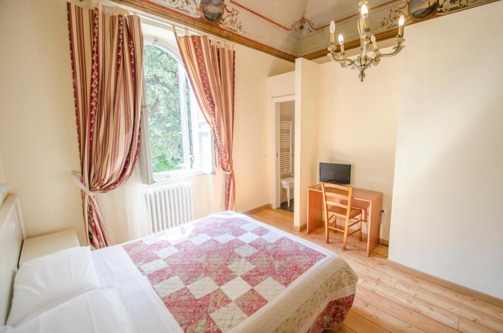 Postel nebo postele na pokoji v ubytování Hotel Iris