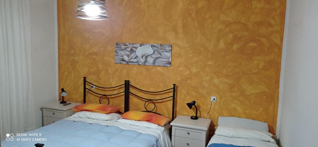 Postel nebo postele na pokoji v ubytování La Piccola Siesta b&b