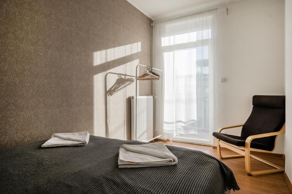 Posteľ alebo postele v izbe v ubytovaní Grand Budapest Penthouse