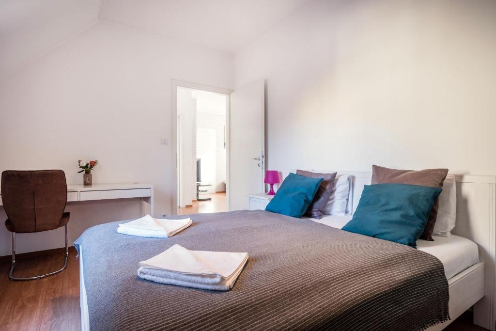 Posteľ alebo postele v izbe v ubytovaní Grand Budapest Penthouse