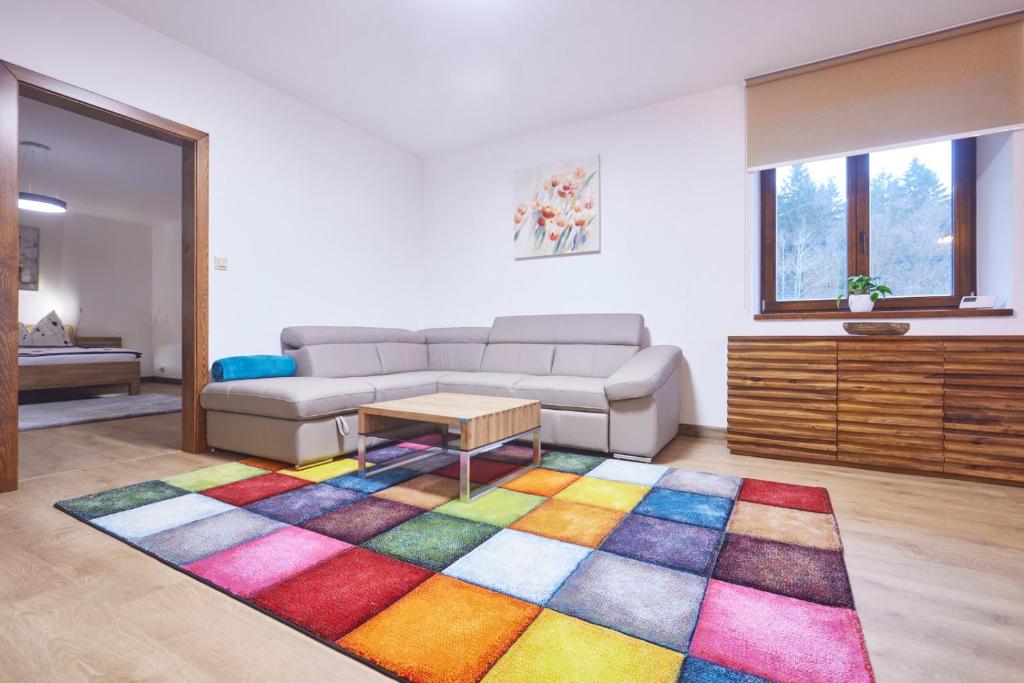 Posezení v ubytování Apartmány na Krásné Vyhlídce
