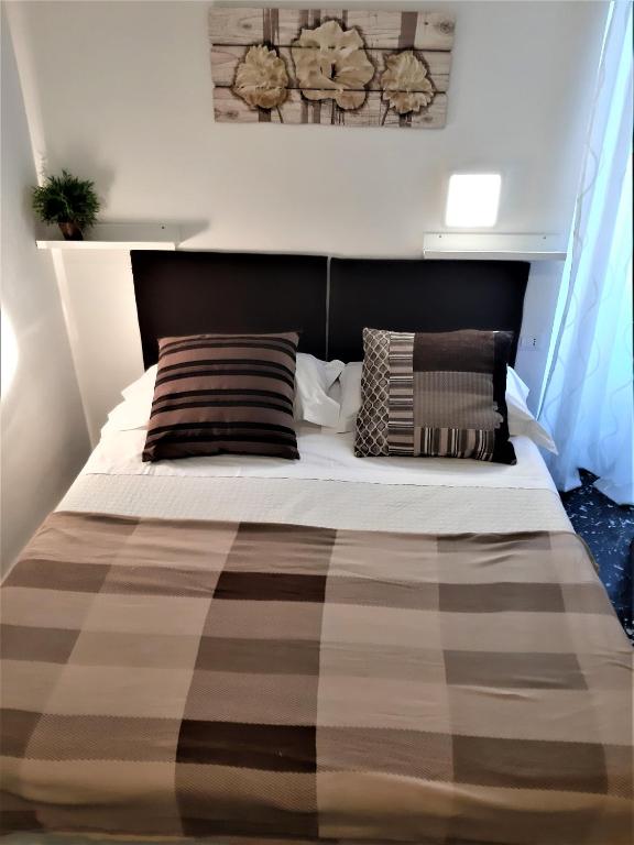 Postel nebo postele na pokoji v ubytování Hotel Victoria