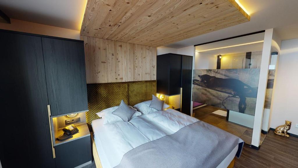 Posteľ alebo postele v izbe v ubytovaní Hotel Panther'A