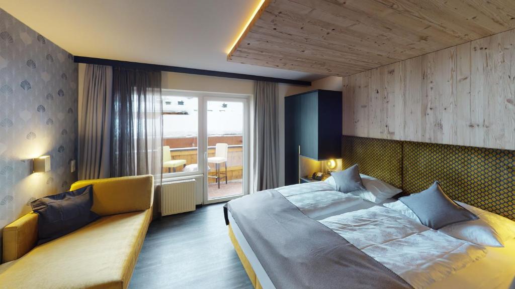 Posteľ alebo postele v izbe v ubytovaní Hotel Panther'A