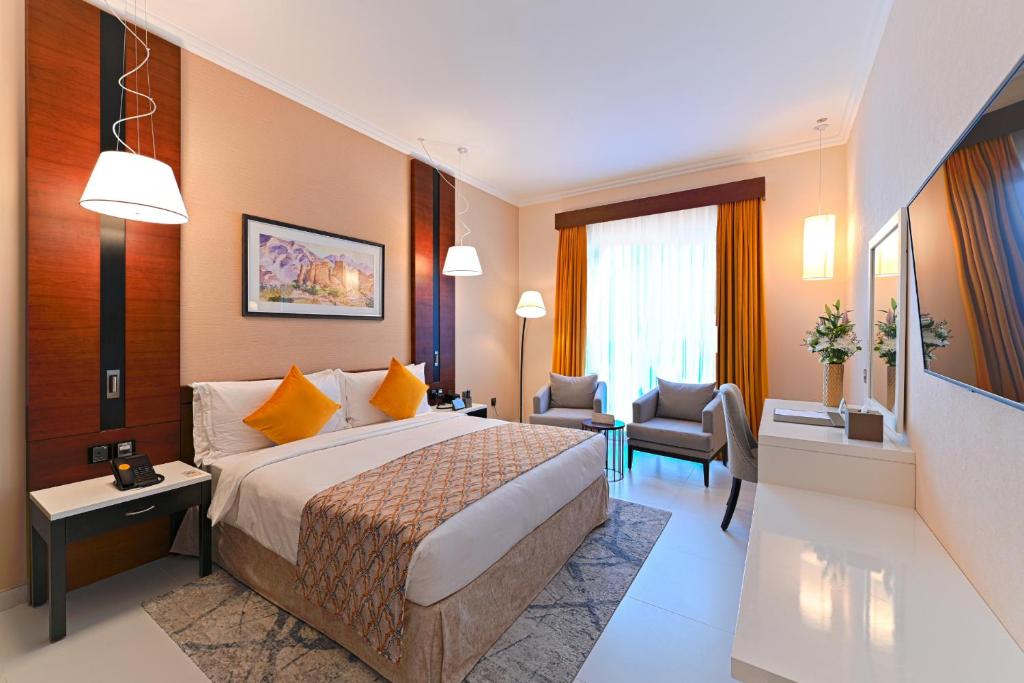 Postel nebo postele na pokoji v ubytování TIME Asma Hotel