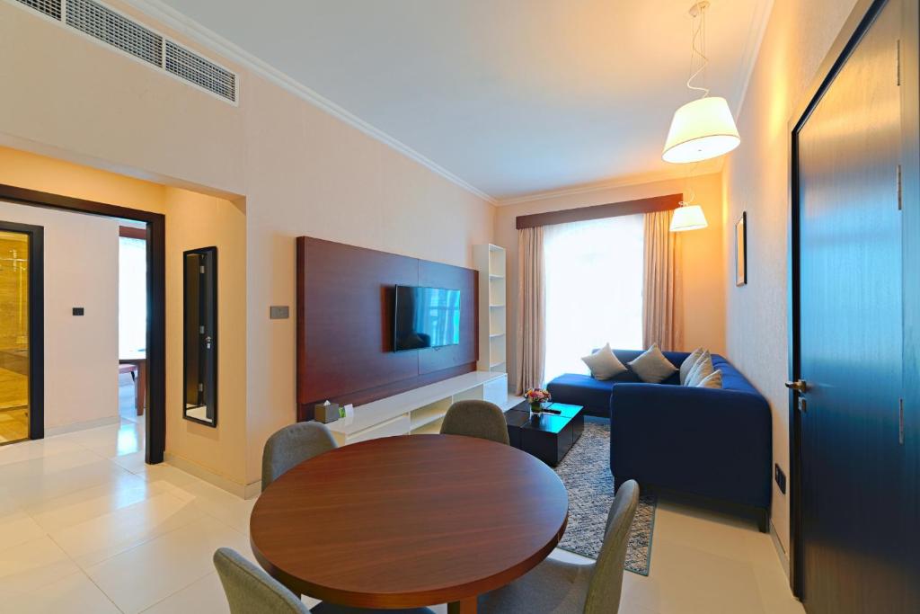 TV a/nebo společenská místnost v ubytování TIME Asma Hotel