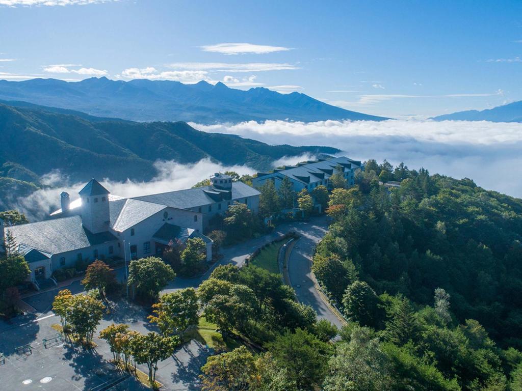 an aerial view of a mountain with a church at Sky Park Hotel in Chino