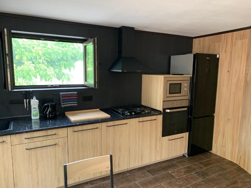 Kuchyň nebo kuchyňský kout v ubytování Bonito apartamento villa Joya