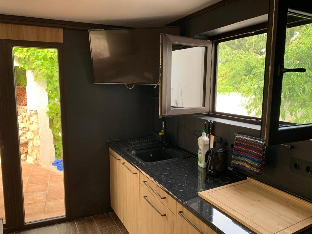 Kuchyň nebo kuchyňský kout v ubytování Bonito apartamento villa Joya