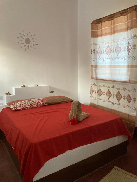 Postel nebo postele na pokoji v ubytování Habibi B&B