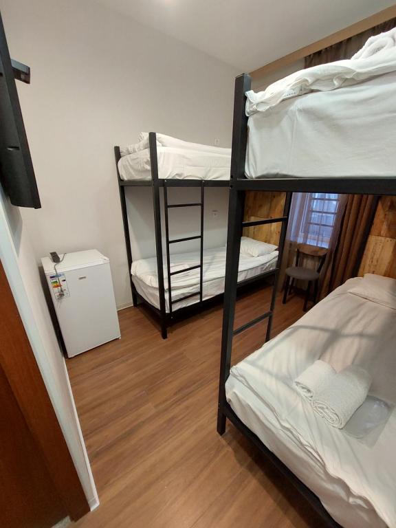 Postel nebo postele na pokoji v ubytování Lori Guest House Hotel