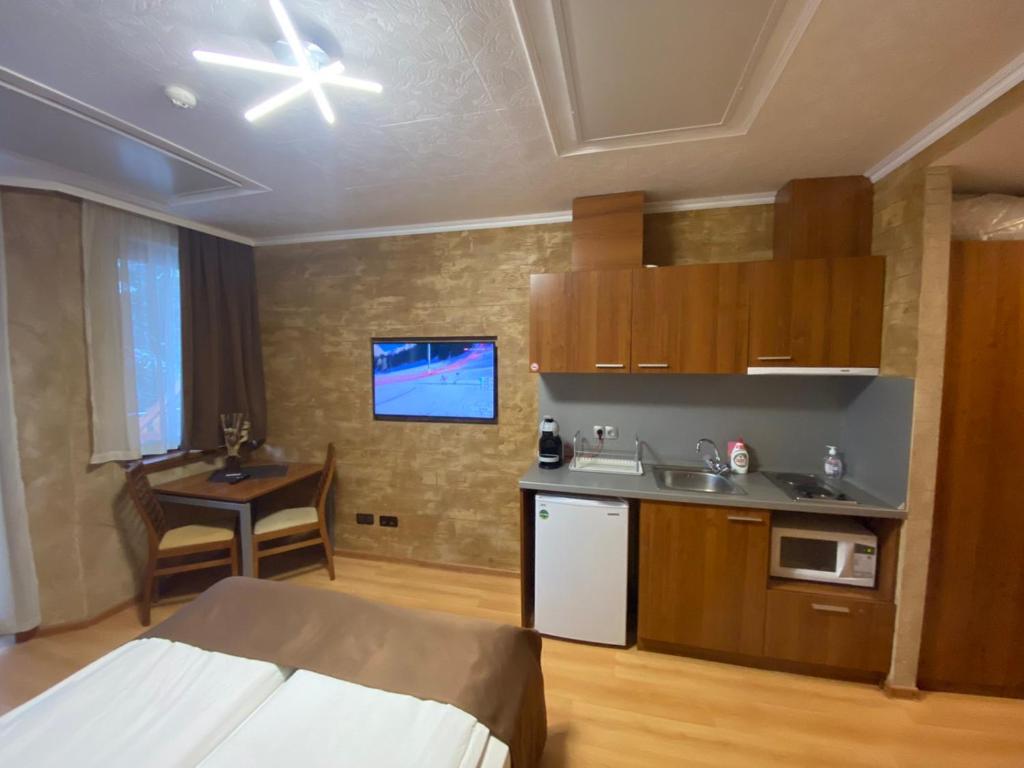 Kuchyň nebo kuchyňský kout v ubytování HQ apartments Villa Park