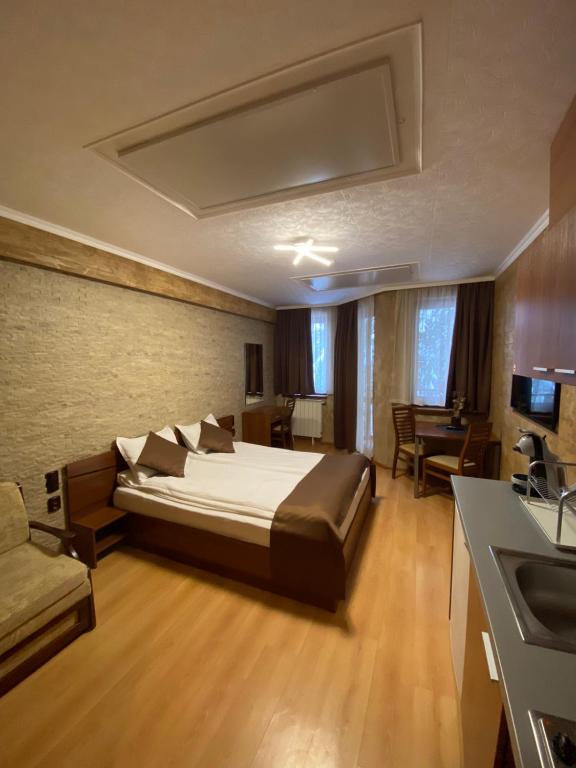 Postel nebo postele na pokoji v ubytování HQ apartments Villa Park
