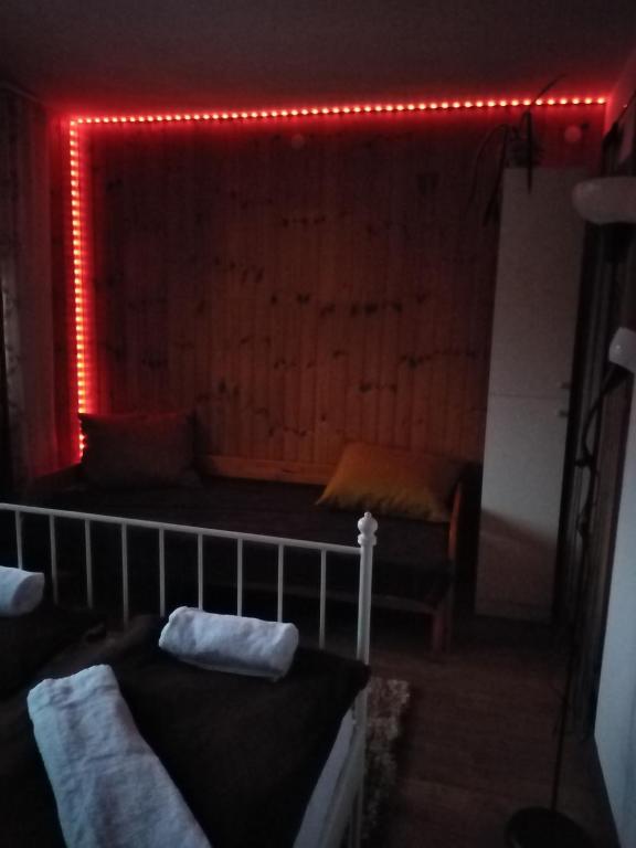 Łóżko lub łóżka w pokoju w obiekcie Lipics Part