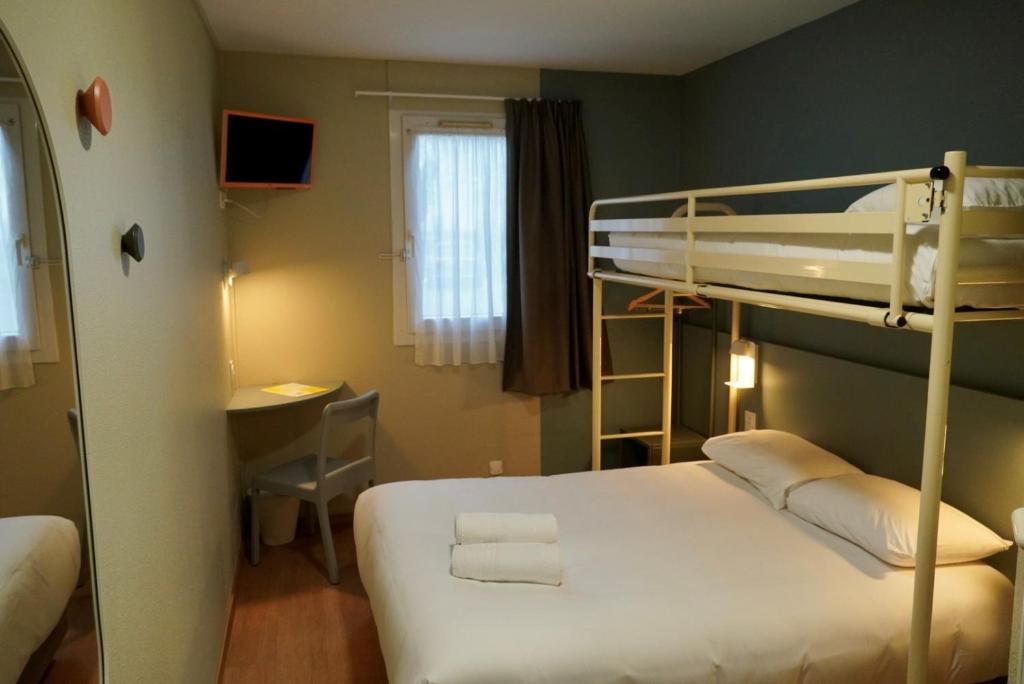Postel nebo postele na pokoji v ubytování Vini Hotel