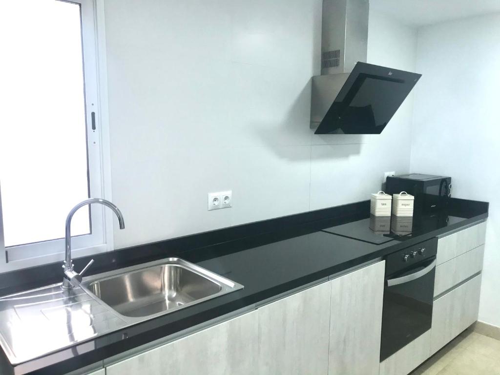A kitchen or kitchenette at Nuevo apartamento en pleno centro