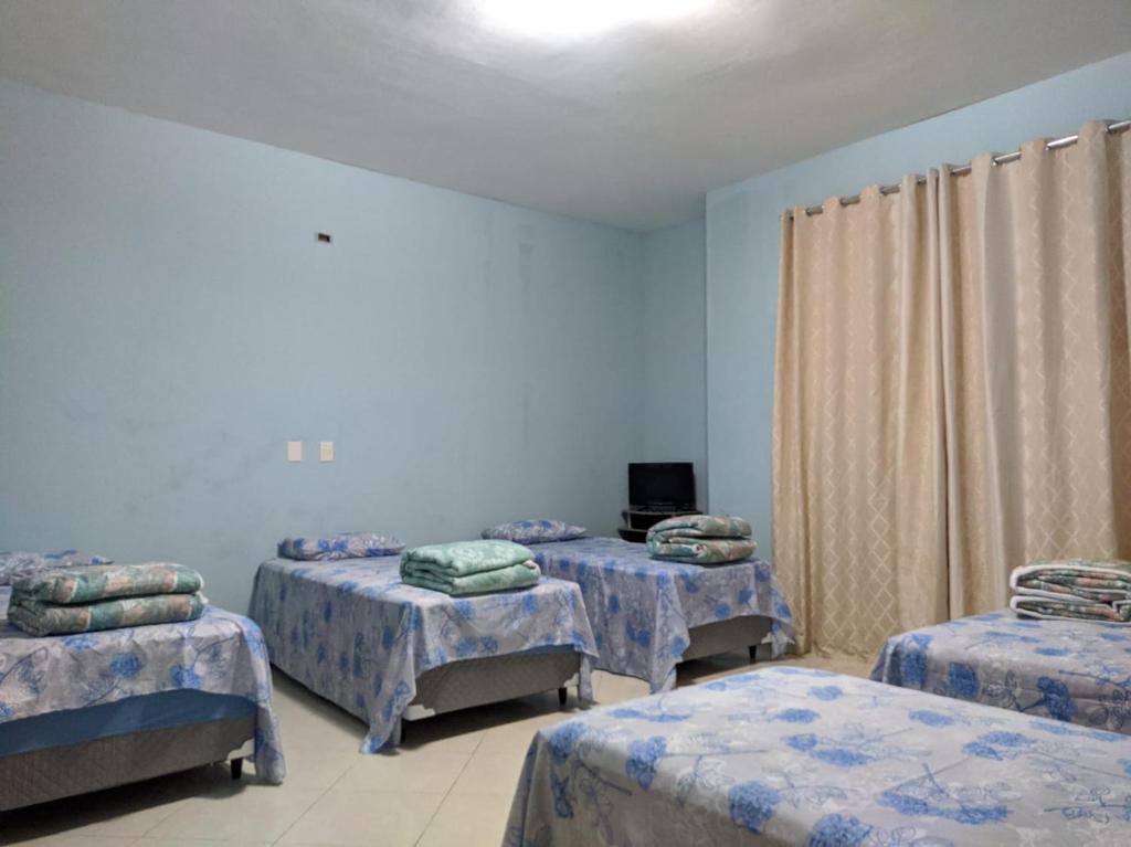 Postel nebo postele na pokoji v ubytování Pousada Emanuell