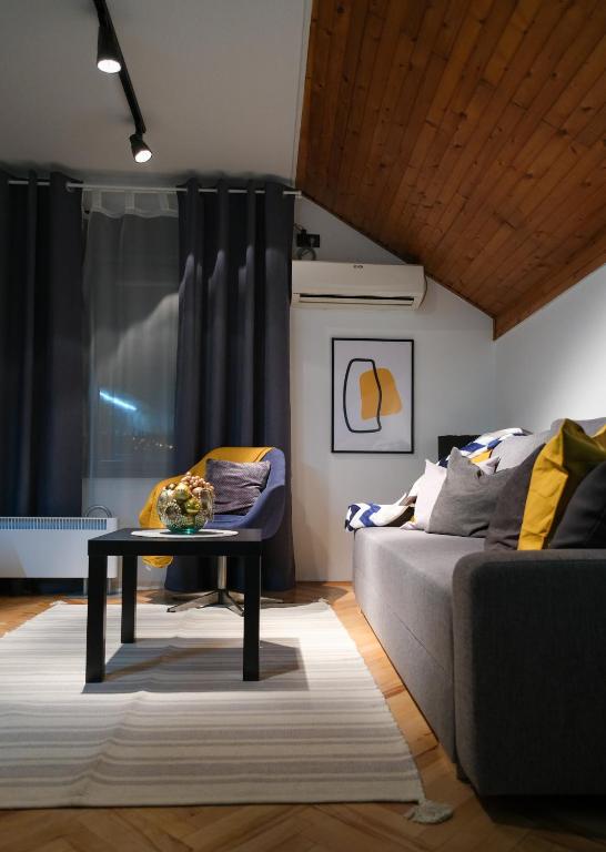 Posezení v ubytování Sunrise Apartments