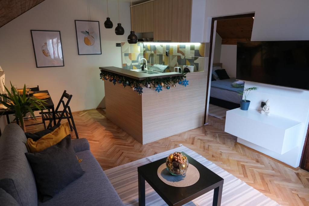 Kuchyň nebo kuchyňský kout v ubytování Sunrise Apartments