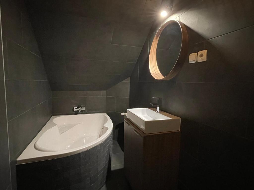 Kúpeľňa v ubytovaní Smeraldo Apartmanok Siófok