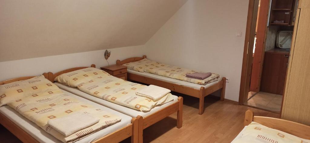 Postel nebo postele na pokoji v ubytování Apartment Majerčák