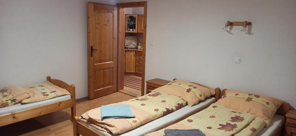 Postel nebo postele na pokoji v ubytování Apartment Majerčák