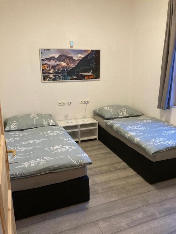 Postel nebo postele na pokoji v ubytování Haus Obernig